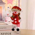 Detail of plush Christmas snowman ornament with red checkered hat and silver beaded legs - F2-3 Hanging Black Leg Snowman