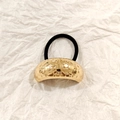 Golden hollow metal ponytail holder with round embossed pattern and black hair tie - Gold Dot Texture 5cm