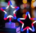 Star-shaped LED neon desk lamp with red, white, and blue lights on a round base - Independence Day Star (3-color) With Base