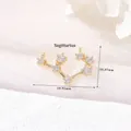 Macro view of 14k gold plated Sagittarius zodiac charm with cubic zirconia stones - Sagittarius