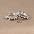 Macro view of 8mm silver hoop earrings featuring black cubic zirconia inlay details - 8mm Silver Black Rhinestone (E1014-8mm)