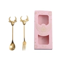 Pink gift box set with stainless steel spoon and fork featuring golden bull heads - Gold Spoon Fork Set + Pink Box