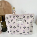 Corduroy makeup bag with purple tulip pattern and Time to Party text in beige - Purple Small Flowers
