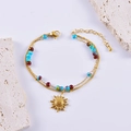 Bracciale a doppio strato con perline colorate e ciondolo a forma di sole dorato - Stile Sole