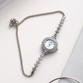 Elegant silver quartz bracelet watch with rhinestone bezel and snake chain heart accents - Silver Band Blue Dial
