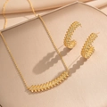 Gold double-row diamond-shaped necklace and earrings jewelry set on beige background - Gold Set