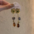 Vista detallada de pendientes con borlas, cuentas de corazón y colgante de resina ámbar - 1# Estilo de Borla Larga Flor Dorada (Pin de Plata)