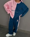 Detail of pink and navy blue sporty set featuring letter prints and badge design - S / Navy Blue