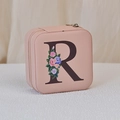 Pink PU leather square jewelry box featuring floral letter R print and zip closure - Print R