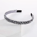 Detailed shot of sparkling silver-grey beaded headband with soft satin fabric and non-slip ends - Four-Row Crystal Silver