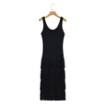 Detail showing the layered fringe design and knitted texture of this black maxi dress - S / Black