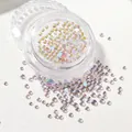 Macro shot of mixed size mermaid aurora glass beads for nail art in round plastic container - Phantom Purple