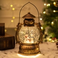 Vintage bronzen kerstlantaarn met drie sneeuwpoppen binnenin en warm LED-lichteffect - Drie Sneeuwpoppen