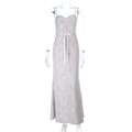 Detailed view of intricate floral lace pattern and delicate waist ribbon bow on the dress - S / White