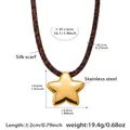 Close-up of leopard print silk scarf necklace with a polished gold star pendant - Gold Star Style (P2164)