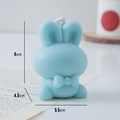 Light blue rabbit shaped scented candle with dimensions 8cm height and 4.5cm width - Blue (Blackberry & Basil)