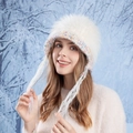 Winter fluffy white faux fur beanie with colorful crochet trim and long wool tassels - Beige