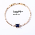 Bracelet doré avec zircons blancs scintillants et pierre centrale carrée bleu foncé - 16K Or Carré Bleu Royal