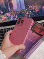Detail of pink glitter phone case for iPhone with shimmering textured finish and camera protection - Pink