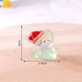 Miniature glow-in-the-dark Christmas cat figurine in translucent light green resin - Green