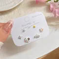 Set de pendientes pastel con agujas de plata 925, diseños de estrellas y gatos - Gato y Pescado Blanco