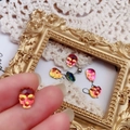 Gothic skull titanium steel ear stud with iridescent aurora resin detail on vintage frame - Multicolor Aurora