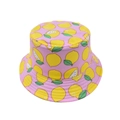 Close-up of pink cotton sun hat featuring cute yellow lemon prints and fine stitching - 2-8 Years / Yellow Lemon (Pink)