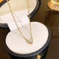 Minimalist gold heart zircon pendant necklace displayed in a luxury jewelry gift box - Heart White Zirconia / Gold