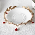Detail of golden leaf bridal crown with red water-drop gemstones and white crystals - Gold with Red Stone