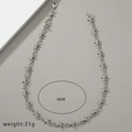 Détail du collier argenté en forme d'épines avec longueur 50 cm et poids 31 g - Argenté