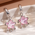 Silver drop earrings with pink star pendants and shimmering crystal accents - Pink Star