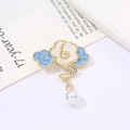 Elegant gold enamel brooch with blue clouds and white flower with a pearl drop - Enamel Pearl Flower