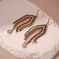 Bohemian gold tassel hook earrings with red and green beads and crystal accents - Black Triangle Arrow Ear Hook