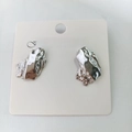 Vintage irregular textured stud earrings in silver finish on a white jewelry card - Irregular Lava / Steel