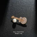 Luxury gold guitar brooch with sparkling crystals and white pearl, size 4.0cm x 1.9cm - Pearl Guitar Gold (XD7197-1)