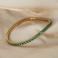 Elegant gold-plated tennis bracelet featuring vibrant round-cut green cubic zirconia - Gold / Green Zirconia