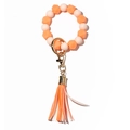 Glow-in-the-dark silicone beaded keychain bracelet with orange tassels and gold metal clip - Peach