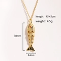 Detail view of a gold koi fish pendant showing precise dimensions and textured scales - Small Fish