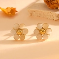 Detail shot of golden flower earrings with white cat-eye stone on a minimalist background - Gold White Cat's Eye Stud Earrings