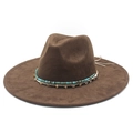 Close-up of brown suede fedora featuring turquoise bead band and metal charm detail - Brown Faux Suede