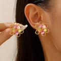 Vintage gold hollow flower earrings with colorful beads shown on a model's ear - Five-petal Wire Outline Beaded Studs / Colored Beaded Gold Studs (18k Gold 0863)