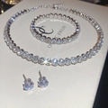 Elegant silver-tone tennis jewelry set with sparkling clear crystals for a luxury look - Three-Piece Set / 50# Silver Tennis Set