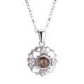 Detail of silver sunflower necklace with 100 languages I love you projection stone - Sunflower Silver