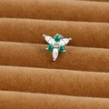 Close-up of a silver floral cartilage stud with green and white cubic zirconia stones - Hexagonal Floral Design (E1357-7)