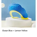Adjustable baby shower cap in ocean blue and lemon yellow with crown design - Lion Shape Blue