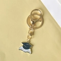 Graduation keychain featuring academic cap and open book charms on a yellow background - Style 6 (Lobster Clasp)