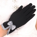 Black knitted gloves with gray faux fur trim and bow detail for winter warmth - Fleece Butterfly - Black
