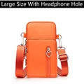 Bright orange crossbody phone bag in large size with headphone hole and heart zipper - Large (With Headphone Jack) / Orange