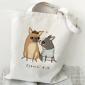 Beige canvas tote bag with French Bulldog cartoon illustration and French Kiss text - French Kiss (J)