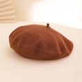 Classic dark brown wool beret featuring a top ball pom-pom detail in retro French style - One Size / Caramel